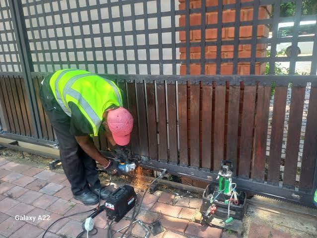 Sliding gate track servicing