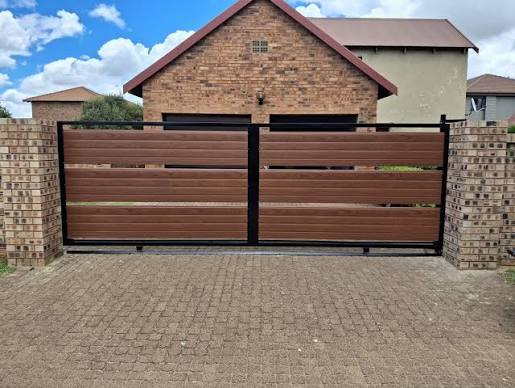 Modern wooden slat sliding gate